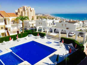 Apartment with pool, sea views & balcony less than 10min walk to La Mata Beach!